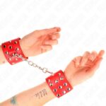 KINK – WRIST RESTRAINTS WITH SNAP FASTEN FULL OF RIVETS RED ADJUSTABLE 19-24 CM X 5.5 CM Fetish / Bondage | SEX Shop Ireland 11