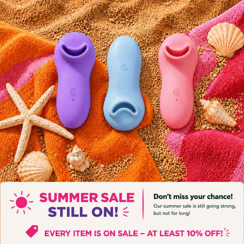 sexstore-summer-sale-all-products-10-percent-off Three different colored vibrators on a summer towel with seashells, with a Summer Sale banner offering at least 10% off all items